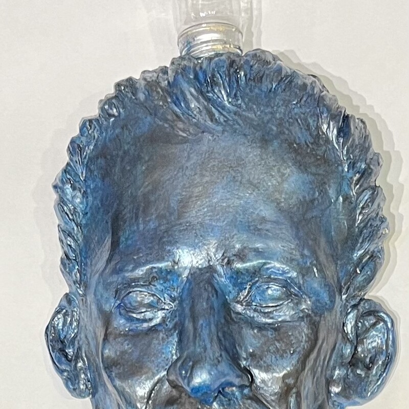 I Got Nuthin #3,
clay and plastic (fake light bulb)

5in. x 9in.

Fred Freeman

This a clay mask. The empty light bulb signifies a lack of any thought.