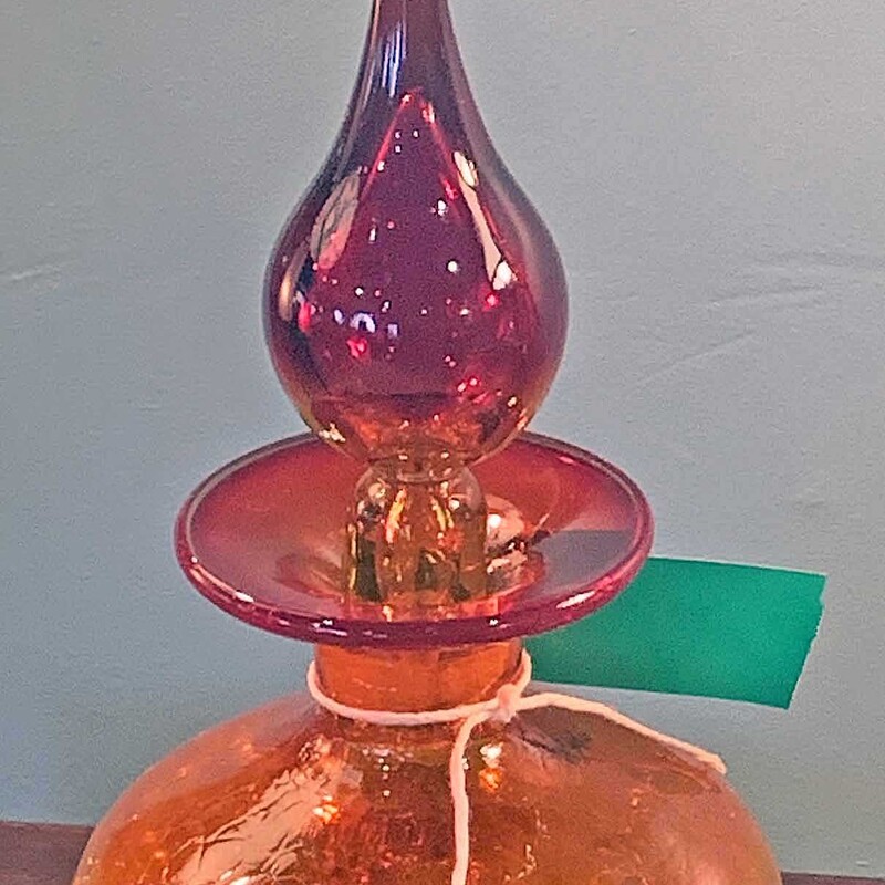 Blenko Crackle Glass Decanter
Size: 13.5 inches tall
From the 1960s, this exquisite hand blown decanter is two tone orange and deep red.  PERFECT condition.