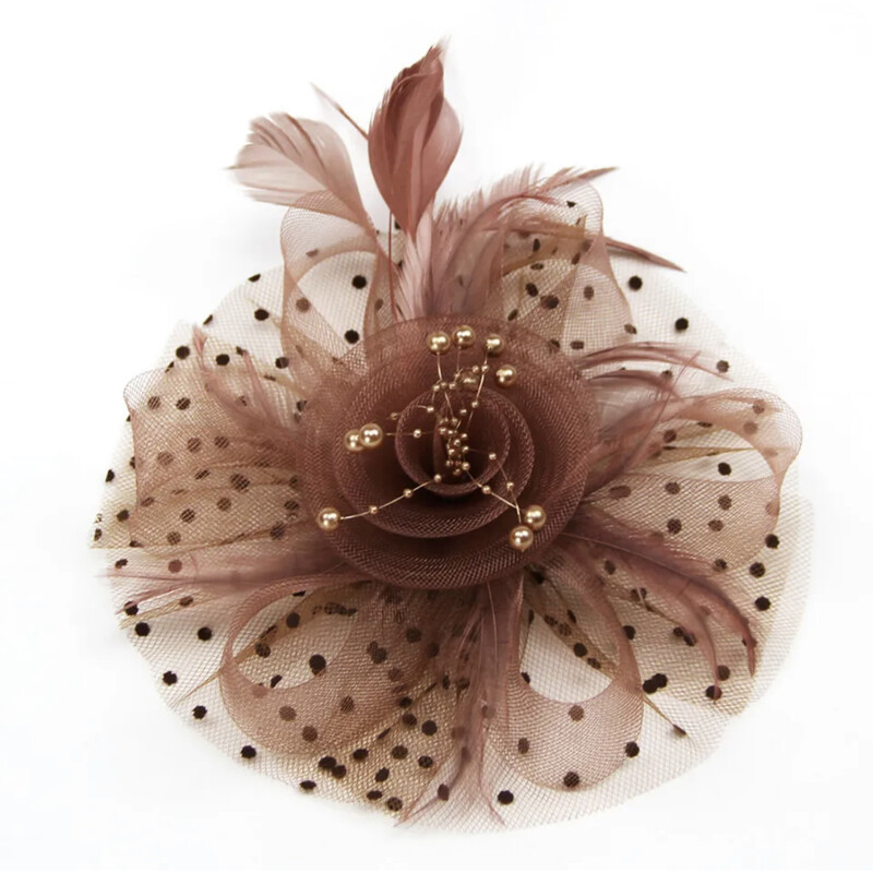 Brand new ribbon with beads and delicate feathers.<br />
Comes with two or 3 options to wear.<br />
A large clip or a headband Some even come with brooch pin so it can be worn on a coat or hat!!<br />
<br />
Several colours to choose from. Call or come into the Boutique for upto date colours & styles available!