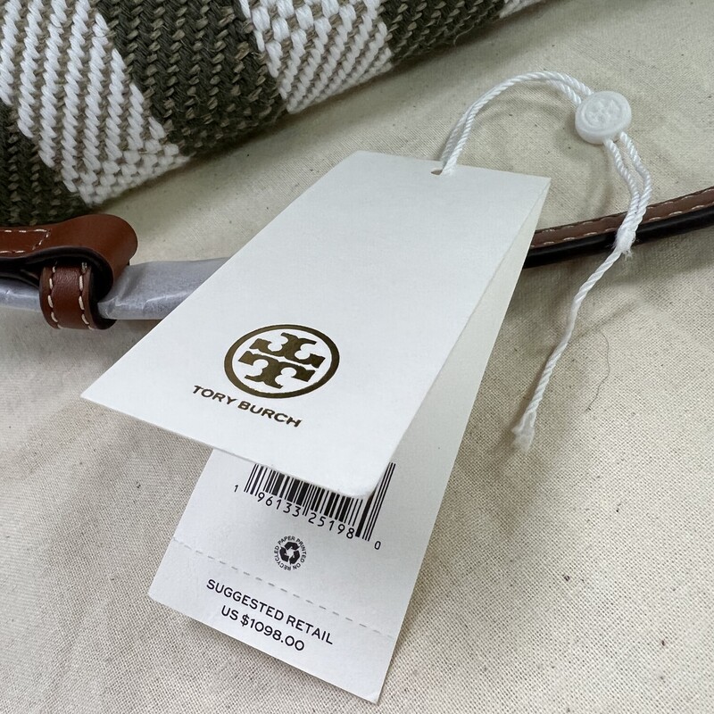 TORY BURCH<br />
LEE RADZIWILL STRIPE DOUBLE BAG<br />
Original Retail Price:  $1,098<br />
Comes with Original Dust Cover and Tags<br />
Paper stil on strap<br />
FLAWLESS  in LIKE NEW CONDITION<br />
<br />
Lee Radziwill Double Bag contrasts structure and softness, and a mix of materials. A little bit undone, the drape and sense of volume are fundamental to the design. Composed of layers that unfold like the collar of a trench coat, it can be worn open, semi-buttoned or fully closed. Beautifully crafted in leather, suede and a striped twill made of linen of cotton, with signature lock-and-key hardware. The collection is named for Lee Radziwill, who was fearlessly unique.<br />
<br />
Fits a laptop up to 15\"<br />
Plain weave, suede and leather trim<br />
Cotton twill lining<br />
Snap stud closures; belted strap with slider buckle closure<br />
Interior top zipper center compartment pocket<br />
5 Interior compartments (1 center zipper compartment, 4 open compartments), 1 side wall zipper pocket, 1 side wall slit pocket<br />
Leather top handle 6\" (15cm) drop<br />
Adjustable, removable shoulder strap with 14.3\" (36cm) drop<br />
Gold-finish hardware<br />
Dust bag included<br />
length: 12.6\" (31.5cm); height: 12\" (30cm); depth: 6.2\" (15.5cm);<br />
Style Number 139204