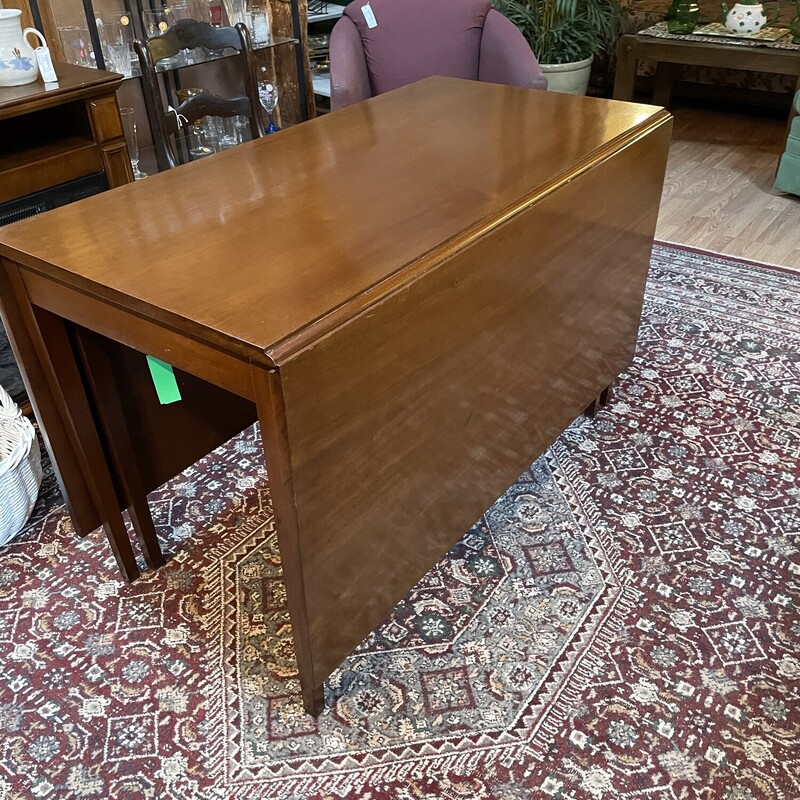 Mahogany Drop Leaf Table,
 Size: 24 X 48  - Each leaf is 24 inches -
Table opens up to 72 inches

This is a beautiful table.  Solid, EXCELLENT condition.
