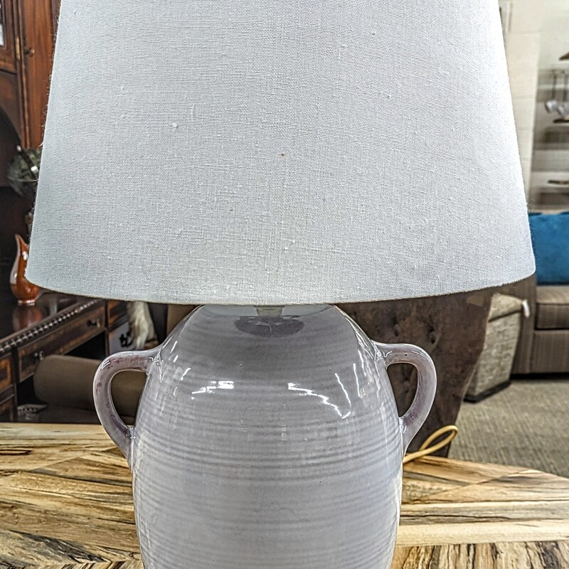Round Handled Ceramic Lamp
White and Cream
AS IS- Scratch on base
 Size: 11x25H
