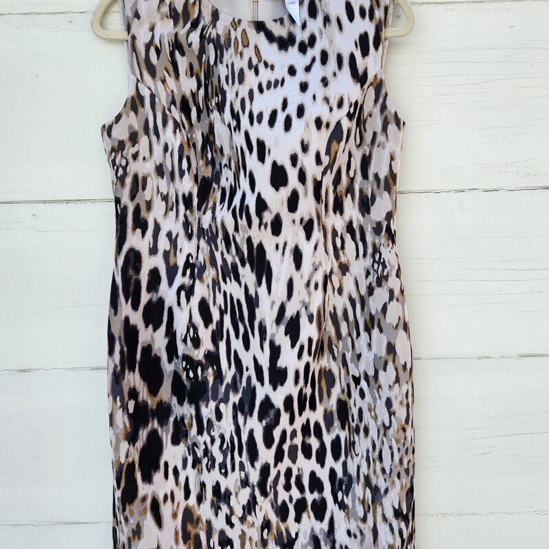 Carolina Herrera sleeveless jacquard animal print with round neckline Dress. It is knee-length and has a back zip closure with an interior clasp.<br />
Size 12<br />
Pit to Pit 18 inches across<br />
Waist 16.5 inches across<br />
Hips 21 inches across<br />
Neckline to bottom on the dress at the back 37.5 inches<br />
Hidden back zipper with hook & eye<br />
Back middle slit 6 inches<br />
two small (wine) spots on Lining<br />
Dress has been Washed