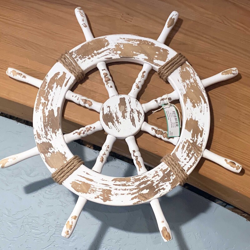 Nautical Wood Ship Wheel

Distressed wooden ship wheel.

16 in diameter 23 in wide with handles