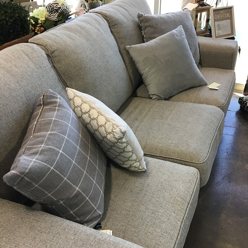 This beautiful neutral sofa is in excellent condition and very comfortable! It features 3 flippable seat cushions and stationary back cushions. The fabric is a gray/cream tweed. Great piece for your family room, game room or living room.<br />
Dimensions are 85 in x 39 in x 38 in