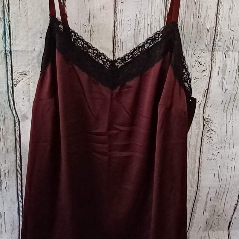 Brand new with tags this tank retails for $35! Super sexy burgandy tank with black lace.