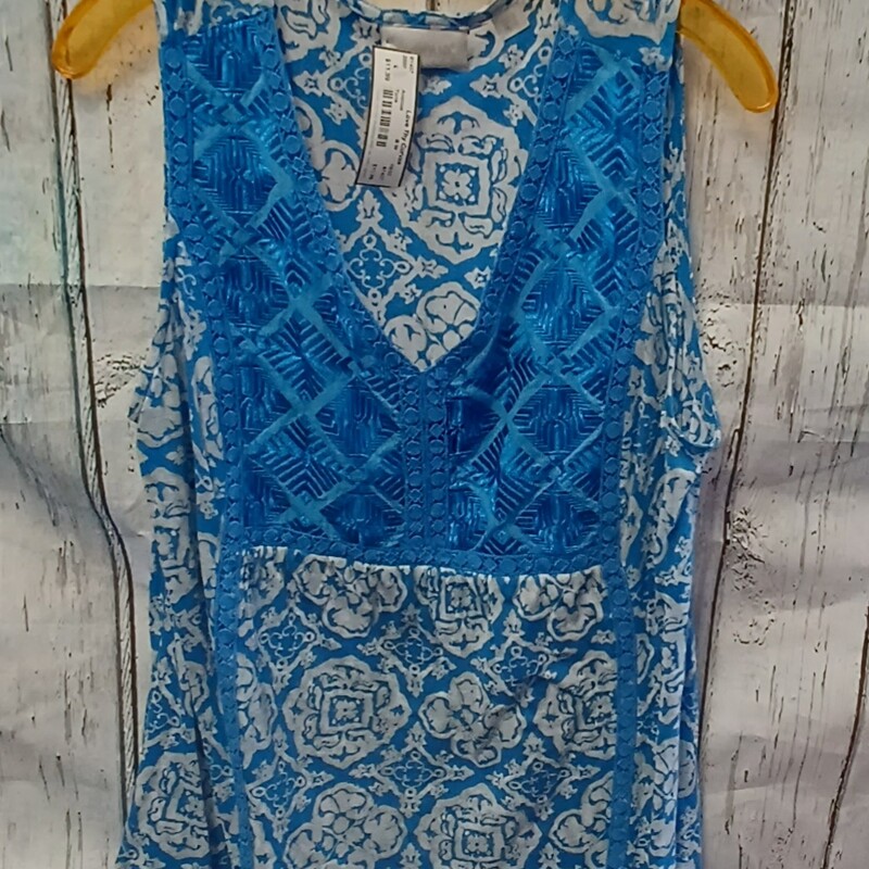 Boho style tank in a white and blue pattern.