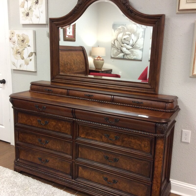 This is a beautiful 4-piece bedroom set from Aspenhome. The set includes a headboard, footboard, a pair of nightstands and a dresser with a mirror.