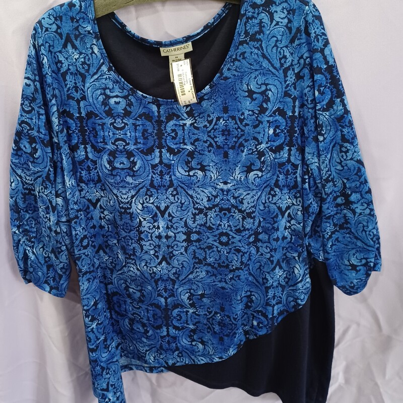 Loving this half sleeve top with blue and navy colors and great print.