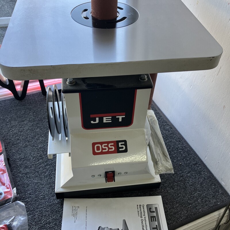 Oscillating Spindle Sander, Jet, JBOS-5

NEW

The JBOS-5 Benchtop Spindle Sander has a 1/2 HP motor, and a large 14-1/2 in. tilting table. A heavy-duty worm gear system provides 1 in. oscillating action, which prolongs sleeve life and helps prevent burnishing of the work piece. 4 inserts are provided and 5 spindles with sanding sleeves.
1 in. oscillating action reduces friction heat to protect wood and prolong sleeve life
Main spindle support runs on precision ball bearings and is oscillated by a heavy-duty worm and gear mechanism for consistent performance
Oscillation gears run in a sealed lubricated box to prolong their life and durability
Table tilts to 45° to accommodate bevel sanding projects
4 table inserts are provided (3/4 in. and 1 in. oblong, 3/4 in. and 1 in. round), to prevent dust and debris from falling into the motor, and help protect operator
Powerful 1/2 HP induction motor easily handles the toughest sanding projects
An oversized/bulky item that requires delivery by truck; please be aware of the dimensions and weight of this machine
JET offers full tech support in order to assist with any warranty issues; please call 1800-274-6846 for assistance
Built-in storage racks keep spindles and table inserts handy
Includes four non-skid rubber feet keep machine stable during use
