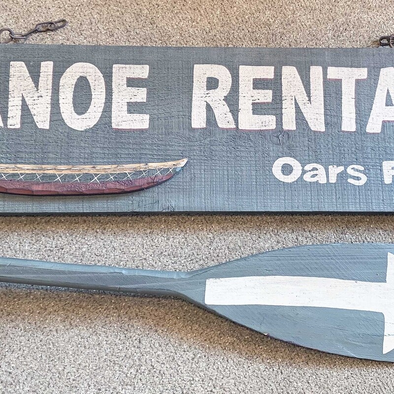 Retro Canoe Rental Sign
 Size: 35x17
Great folart sign with hand carved canoe and oar.  Can be wall hung or chain hung.