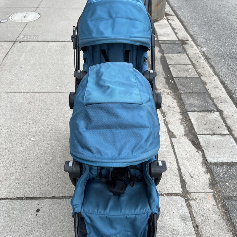 City Select Stroller - Baby Jogger, Teal, Size: Double
2015


Simply & compact folding
Snap lock for transportation or storage
Over 16 possible configurations
Front-facing or parent facing
Multiple reclining positions
Multi-position foot well
UV 50+ sun canopy
Peek-a-boo window with magnetic closure so you can quietly check on your little one and it can be adjusted for different head heights
8” lightweight front wheels
12” forever-air rear wheels
A telescoping handlebar adjusts to your height
Hand-operated parking brake