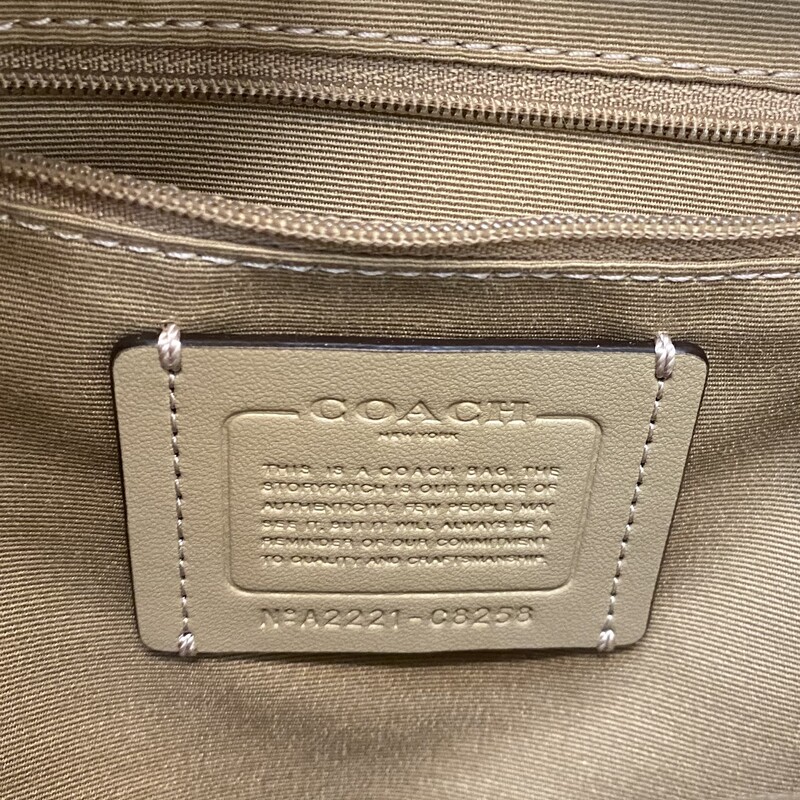 Coach Mini Pear Signature Court Backpack<br />
Coach Mini Court Backpack In Signature Canvas<br />
Color: Gold / Light Khaki Chalk Multi<br />
Signature coated canvas and refined pebble leather<br />
Inside zip and multifunction pockets<br />
Double zip closure, fabric lining<br />
Handle with 1 1/2 drop<br />
Outside zip and open pockets<br />
Adjustable shoulder straps<br />
8 (L) x 9 (H) x 3 1/2 (W)<br />
Style No. C8258
