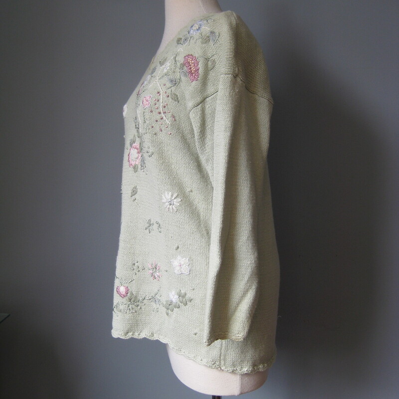 Vtg Shenanigans Embrd, Green, Size: Large<br />
<br />
This pretty vintage sweater by Shenanigans s is made of celadon pastel green  ramie cotton blend and features mainly pink floral embroidery on the front.<br />
The flowers are pink and blue with green leaves and sprinkled with tiny pearls.<br />
The sweater is long with long sleeves and has a high v neck.<br />
<br />
Flat measurements:<br />
Shoulder to shoulder: 22.25<br />
Armpit to armpit: 20.5<br />
Underarm sleeve seam: 16.5<br />
Width at hem: 21<br />
Length 27<br />
<br />
Thanks for looking!<br />
#59376