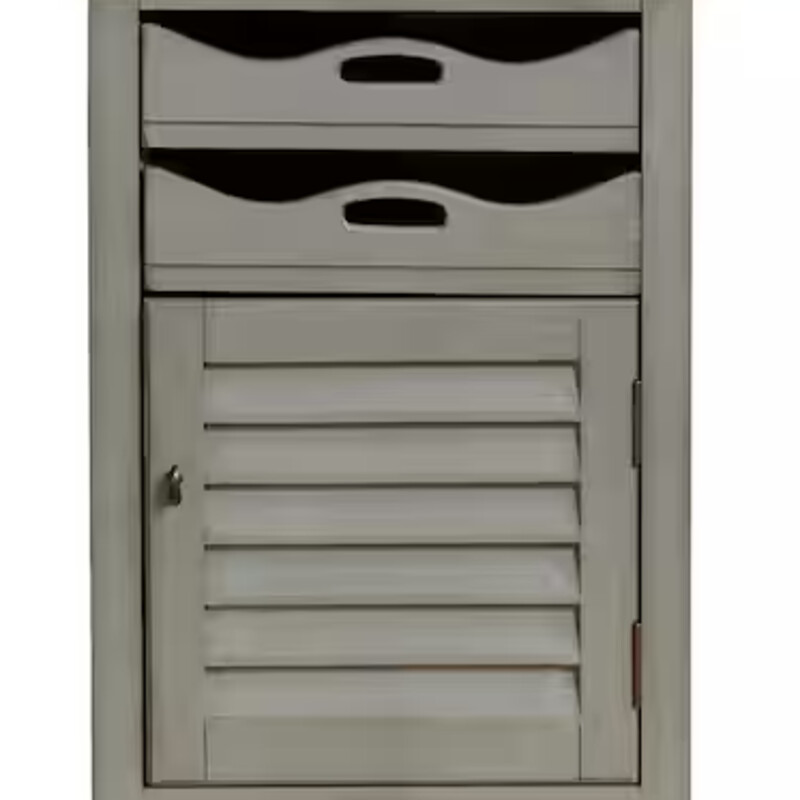 Madrillion Cabinet<br />
Lt Green Grey  Size: 20x16x31H<br />
1 Door 2 Drawers<br />
Small in size, this cabinet is big on storage options. The scalloped shape of the two slide-out trays adds character, as does the louvered design of the solid cabinet door below.<br />
NEW Retail $540