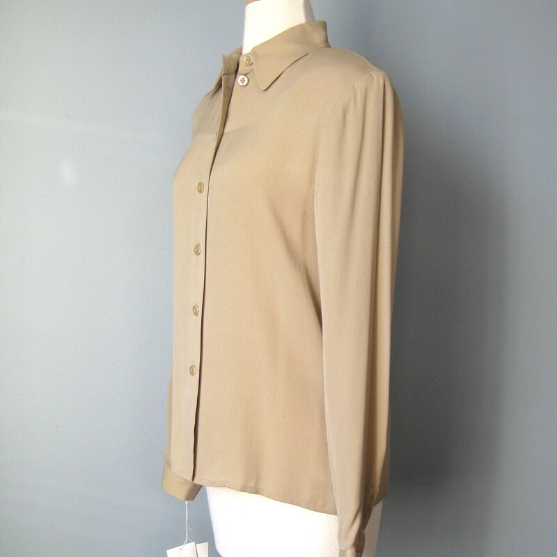 Simple silk gauze blouse by Carlisle from the 1980s in classic camel. Simple button down. This shirt has infinite versatility for work or casual looks with an old money vibe.<br />
Big shoulder pads<br />
Made in Hong Kong<br />
New with tags.  No flaws!<br />
<br />
Flat measurements:<br />
Shoulder to shoulder: 16<br />
Armpit to armpit: 20<br />
underarm sleeve seam: 18<br />
length: 26.25<br />
<br />
thank for looking!<br />
#45549