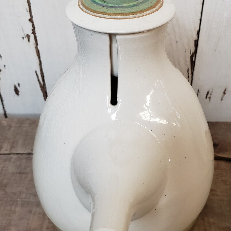 Vintage Ceramic Teapot. Size: 8in tall.