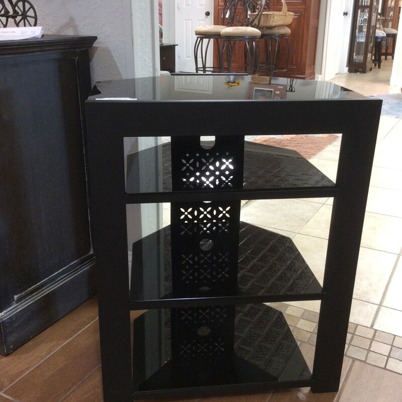This is a black glass, 4 shelf Stereo Shelf. This shelf has a hole in the back for cords to go through and plently of space for CD's.