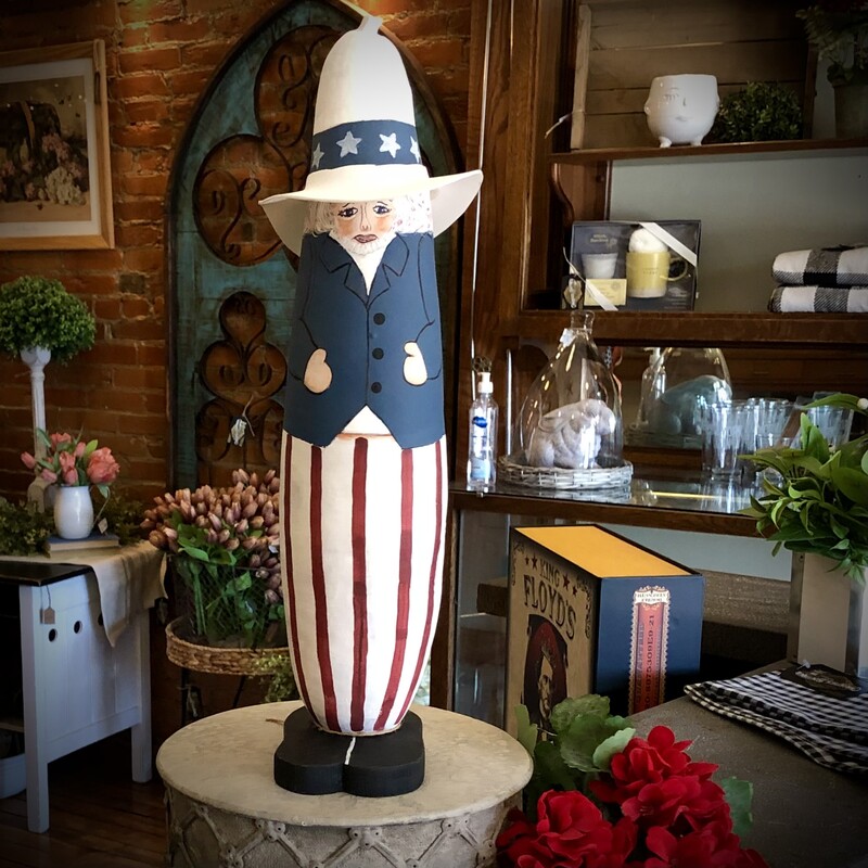 Uncle Sam
17 H x 5 W x 6.5 D

Check out this amazing hand painted dried gourd!  It's a tiny masterpiece, a work of art that brings a touch of magic and patriotism to any space.