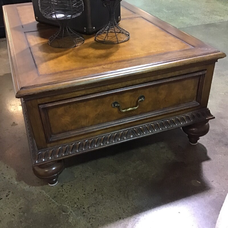 Ethan Allen Furniture
LeatherTop
Rectangle CoffeeTable
Two end drawers
Beautiful wood detailing
Round feet

Dimensions:  51x32x16