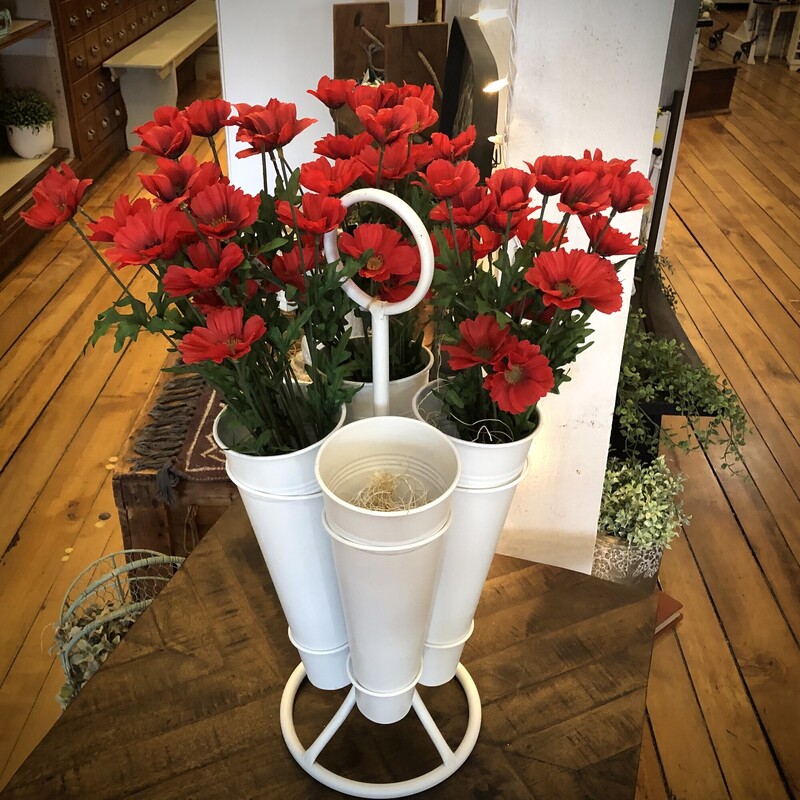 Long Stem Floral Caddy<br />
22H x 11W<br />
Behold the Flower-licious Wanderlust, a long stem floral caddy that's as whimsical as it is practical, ready to take your flower arrangements on a joyous journey!<br />
This caddy has four removable cones to add versatility.