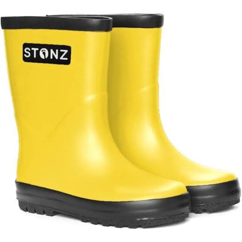 Stonz Rain Boots, Yellow, Size: 5T<br />
Stonz are made with natural rubber and are 100% waterproof with soft cotton lining for comfort and function.<br />
<br />
Features<br />
Vegan friendly Made with natural rubber<br />
Free from PVC, phthalates, lead, flame retardants and formaldehyde<br />
Extra wide opening makes them easy to put on<br />
Non-slip soles for safe play and Soft cotton inside lining<br />
Soft and flexible natural rubber for increased comfort<br />
Can be layered up with Stonz Rain Boot Liners for extra warmth