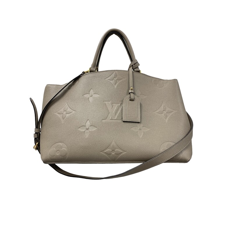 Louis Vuitton Grand Palais<br />
Color: Turtle Dove<br />
Retails:3,500<br />
13.4 x 9.4 x 5.9 inches<br />
(length x Height x Width)<br />
Tourterelle Gray<br />
Monogram Empreinte embossed supple grained cowhide leather and supple grained cowhide leather<br />
Supple grained cowhide-leather trim<br />
Microfiber lining<br />
Gold-color hardware<br />
3 compartments with a zipped central compartment<br />
Inside zipped pocket