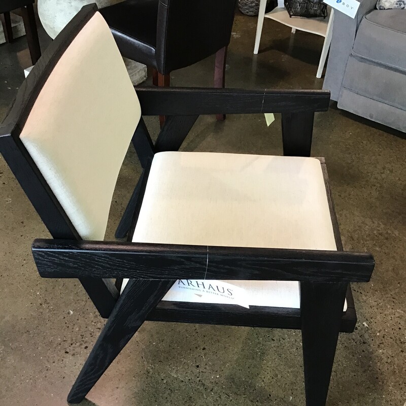 This beautiful chair from Arhaus has never been used! It is still on their website ( price is $599) and the description is as follows:

Inspired by iconic midcentury styles, our Kroy Collection showcases bold silhouettes crafted from solid oak accentuated by an artisan-distressed, hand-stained finish. Upholstered seats covered in Crypton® Performance Fabric.

Dimensions - 25 in x 27 in x 32 in