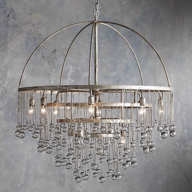 Arhaus Aubrey Chandelier
Silver Metal with Clear Prisms Size: 36x41H
Equally at home in an ancient French castle or a downtown New Orleans loft, this chandelier creates dramatic ambiance in any setting. Crystal drops hanging in varying lengths from an iron cage create the illusion of movement as they catch the light, refracting brilliant beams around your room.
Retail $5349