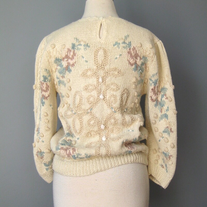 Vtg Needleworks Embrd, Cream, Size:
This pretty vintage sweater by Needleworks was hand knitted with a beautiful textured scrolly design on the front and the back.
Ivory base with pastel blue and pink design.
Small
Sleeves are short will hit at about the elbow
cotton ramie blend, pretty tight knitting, not a lot of stretch
Flat measurements:
Shoulder to shoulder: 15.75
Armpit to armpit: 18
Underarm sleeve seam: 11
Width at hem: 16.5
Length 22.5

Thanks for looking!
#55363