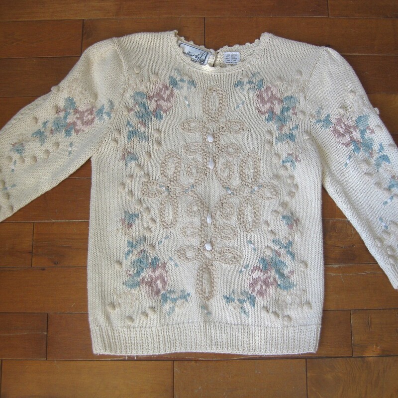 Vtg Needleworks Embrd, Cream, Size:<br />
This pretty vintage sweater by Needleworks was hand knitted with a beautiful textured scrolly design on the front and the back.<br />
Ivory base with pastel blue and pink design.<br />
Small<br />
Sleeves are short will hit at about the elbow<br />
cotton ramie blend, pretty tight knitting, not a lot of stretch<br />
Flat measurements:<br />
Shoulder to shoulder: 15.75<br />
Armpit to armpit: 18<br />
Underarm sleeve seam: 11<br />
Width at hem: 16.5<br />
Length 22.5<br />
<br />
Thanks for looking!<br />
#55363
