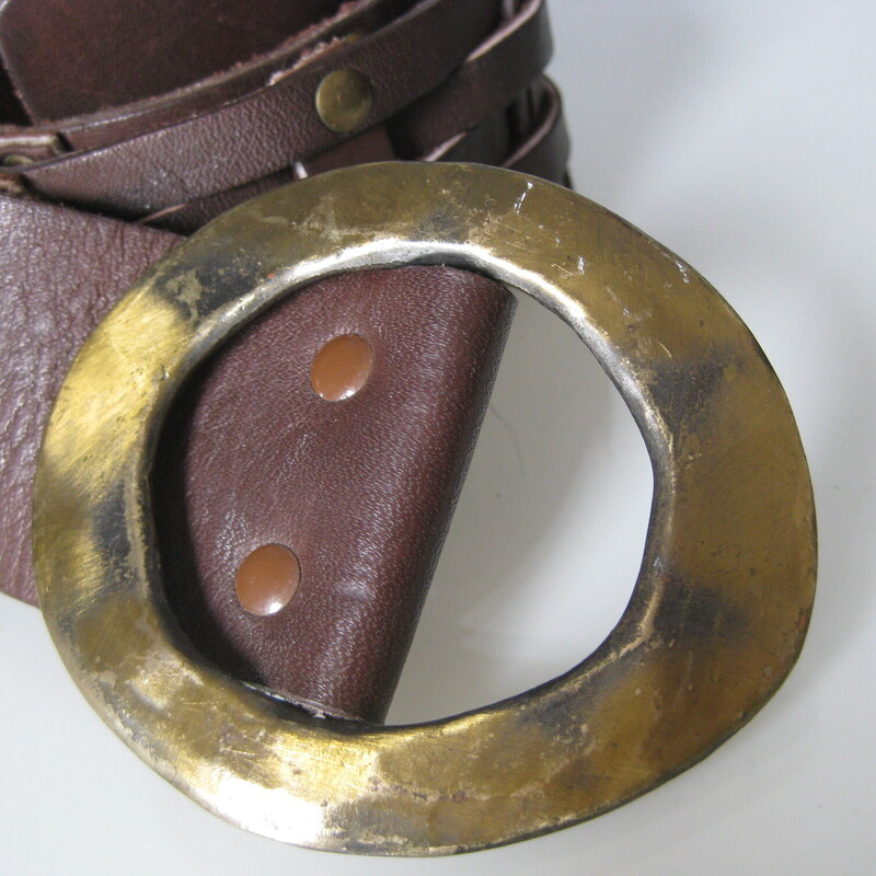 V Vtg Suede & Brass Belt, Brown, Size: None<br />
Cool leather belt of strips of rawhide brown leather woven together and joined by brass studs.<br />
The buckle slides along the length (doesn't have a prong) and is made of hammered and antiqued brass.<br />
Gives middle ages!<br />
<br />
<br />
Length: 36<br />
Width: just under 2<br />
<br />
no marks<br />
<br />
thanks for looking!<br />
#963
