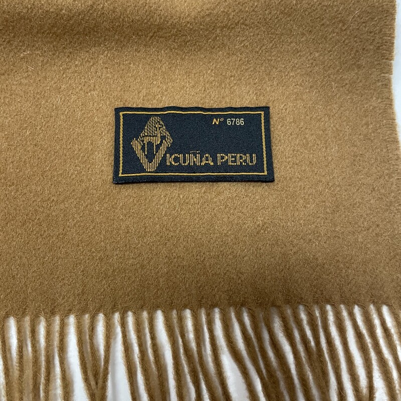 Basel - Vicuna:  NEW Designer 100% Vicuna Scarf made in Peru and includes wooden box.   Camel, measuring 56 x 12 inches.  Vicuna is made of the finest fiber in the world: luxurious, extremely light, amazingly soft, and provides unrivaled warmth.   This scarf retails for $1,800,  must be special ordered, and takes 4 to 6 weeks for delivery.  But its here NOW and can be yours at our 2nd hand market price, and no wait time.