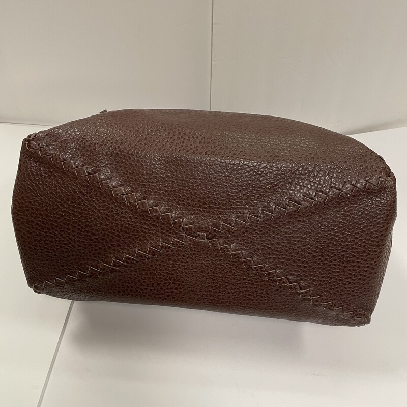 Bottega Veneta:  Textured Leather Weekend Bag, Chocolate, Size: 24 x 18 x 8.5 inches. Not to be fooled by its  Masculine look, this bag would made a beautiful addition to the travel styles of anyone.