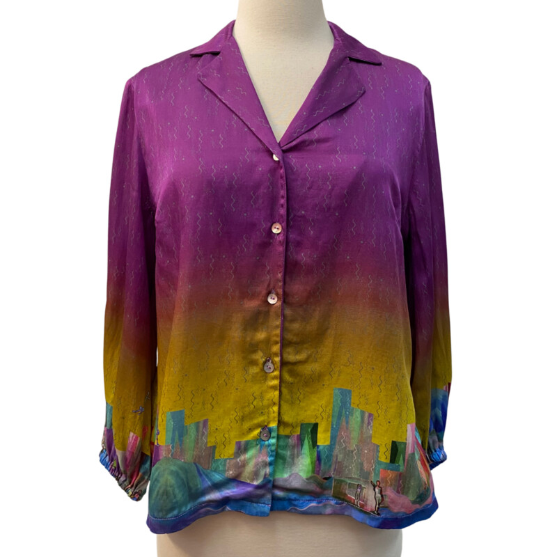 NEW Manimekala Blouse<br />
Twilight Dreamscape<br />
Crafted from a blend of luxurious silk and crisp cotton, it has a vintage-inspired pyjama collar, loose fit and slightly cropped balloon sleeves.<br />
Size: Medium