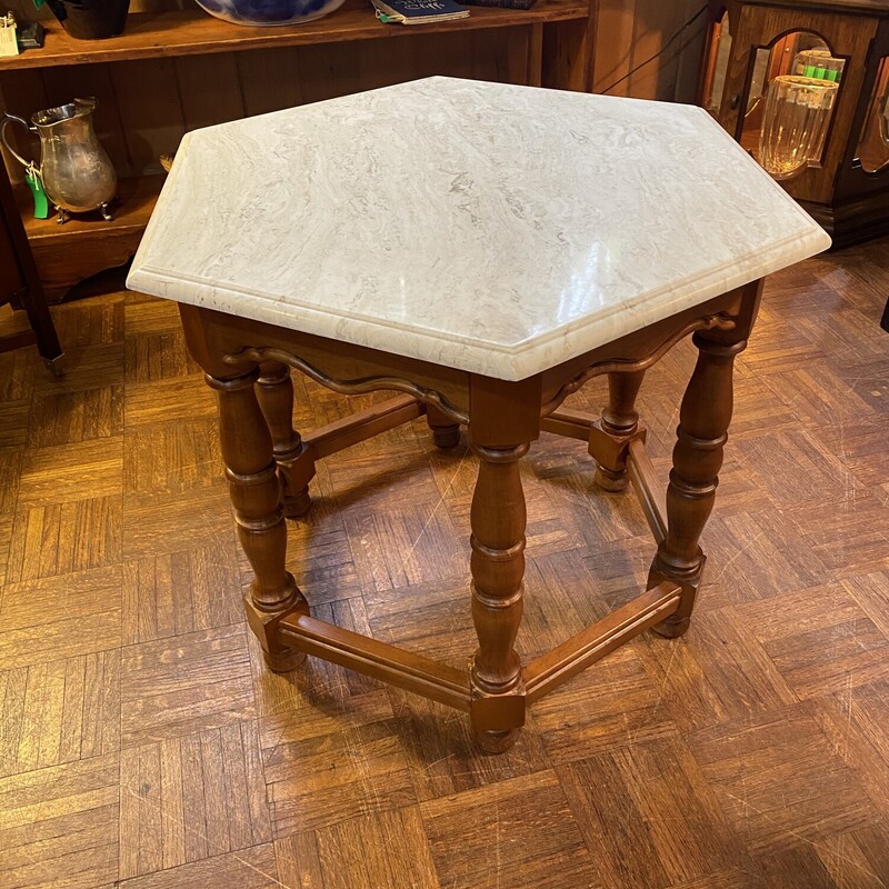 Hexagon Stone Top Table
Maple Wood, with a detachable stone top table.

 22 inches High 27 inches Wide