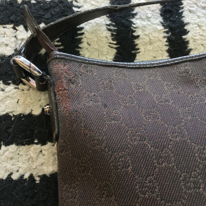 Gently used Gucci crossbody. Dark brown Gucci GG canvas with dark brown leather detailing and silver hardware. Come signs of use (shown in photos). Strap in great condition, and adjustable. Gorgeous staple for your closet! Retail approx: $1,800