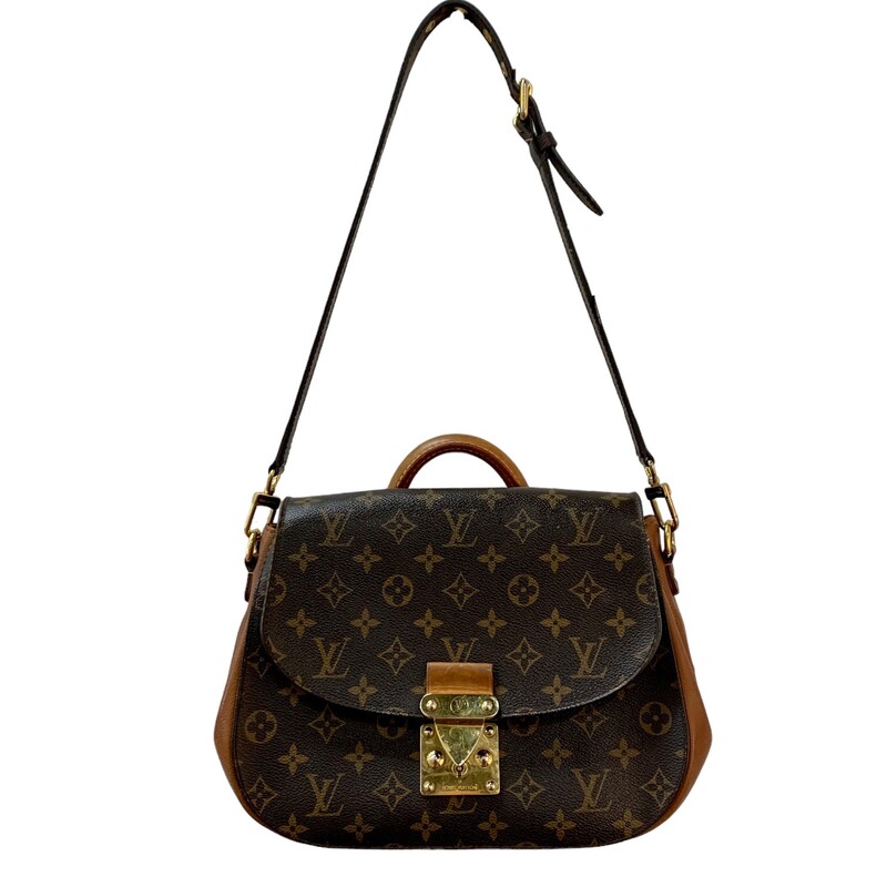 Louis Vuitton Eden 2 Way Bag
Size MM
Date Code : AR2132
This versatile handbag is crafted of traditional monogram toile canvas and features a unique mix of rich calfskin and natural vachetta leather. This bag has a steamer-inspired top handle, an optional monogram coated canvas shoulder strap, and a vachetta leather base. Polished brass signature hardware is found at the frontal press lock, the strap links, and the feet. The front flap opens to a partitioned cocoa microfiber interior with zipper and flat pockets.