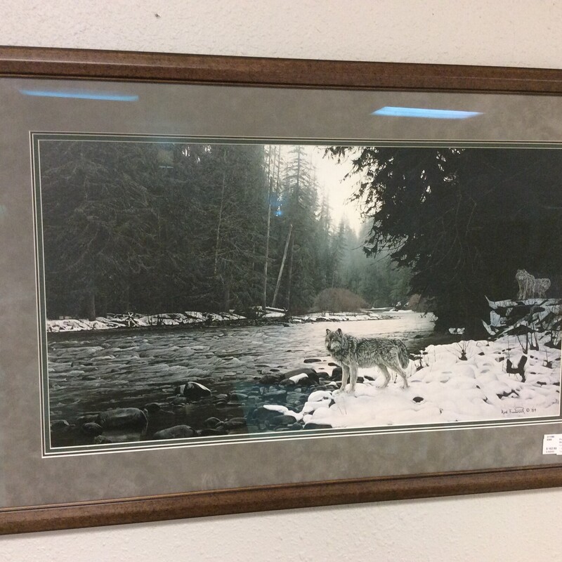 This is a beautiful painting of Wolves at Timbers Edge that is signed and Number by Rod Fredrick. This painting has a nice gray matting and brown frame.