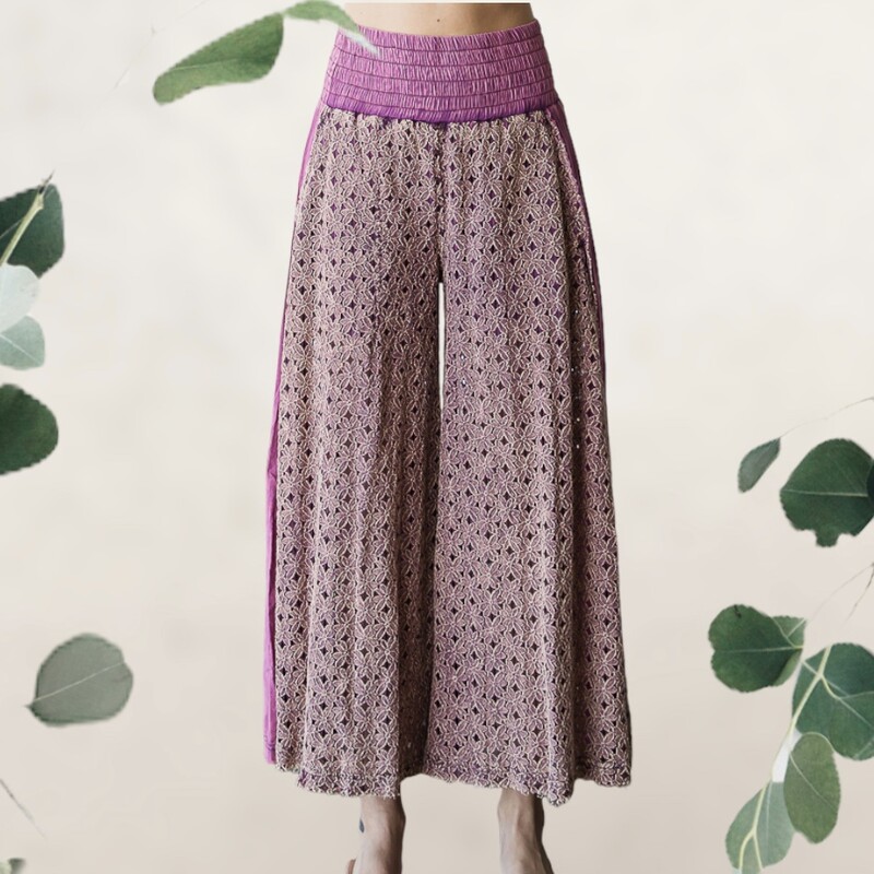 These whimsical wide legged pants are as comfortable as they are stunning! The waistband has plenty of stretch, and the fabric is soft!
