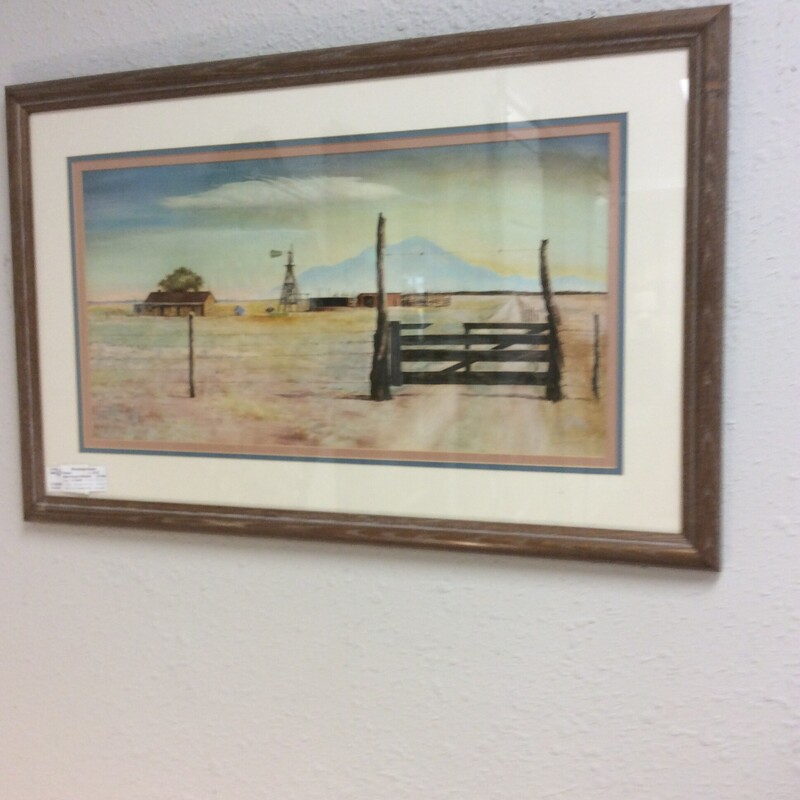 This is a print by the famous Texas artist Peter Hurd. Know for his depictions of West Texas.
