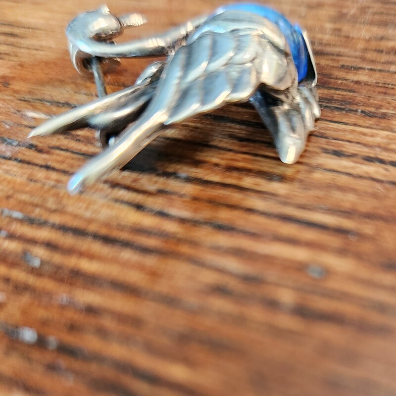 Charming vintage sterling silver blue glass swan brooch. Hallmarked for Alfredo Villasana, Mexico.
This well made sterling silver swan was made in the 1950's in Taxco, Mexico by famed artisan Alfredo Villasana. The body of the swan is blue glass. The pin is in good vintage condition with no problems. This measures about 1 1/2 inches by 1 1/4 inches and weighs 7 grams. This is hallmarked Hecho En Mexico, Taxco in a circle around a conjoined AV and Sterling 925. .2 oz
Villasana worked for Spratling and later Aguilar before opening his own shop in the 1950's.