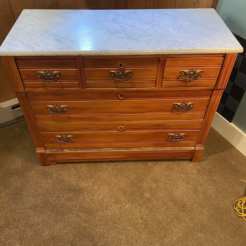 Marble Top Dresser
Dove Tail Drawers, 5 Drawers, 3 Small, 2 Large
 Marble is cracked but hard to notice
31 Inches High, 40 Inches Wide, 17 Inches Deep