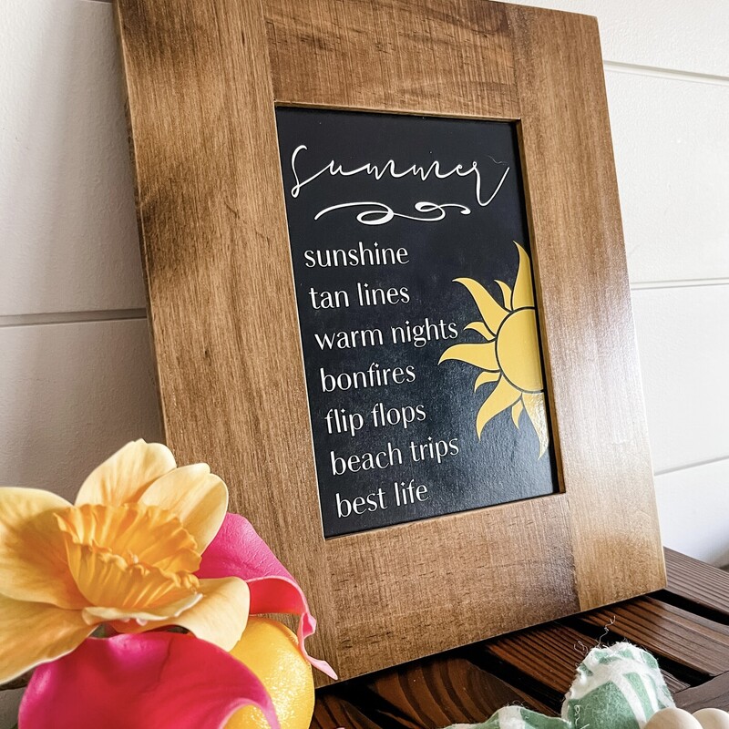 Can't get enough of summer? Us either! So we made a checklist of our favorite things about summer! A unique twist on our usual signs; this piece is made from an actual wood picture frame and includes the frame stand attached to the back for easy display anywhere! This piece is for a 5x7 photo; so it's full dimensions are approximately 8x10 on the outside.