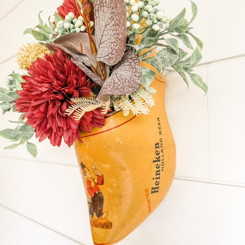 Want a truly unique piece to decorate with this summer? This vintage Heineken beer clog floral wall hanger is about as unique as you can get! Made from an authentic vintage wooden clog that was made in Holland for the Heineken beer company; this quirky little cutie is the perfect break from the norm decor piece!