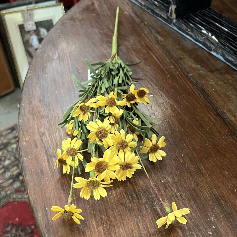 Mini Daisy Yellow featues small yellow daisy flowers on  a bendable, wrapped stem with long green leaves. Stem is made of fabric and foam and is 18 inches long