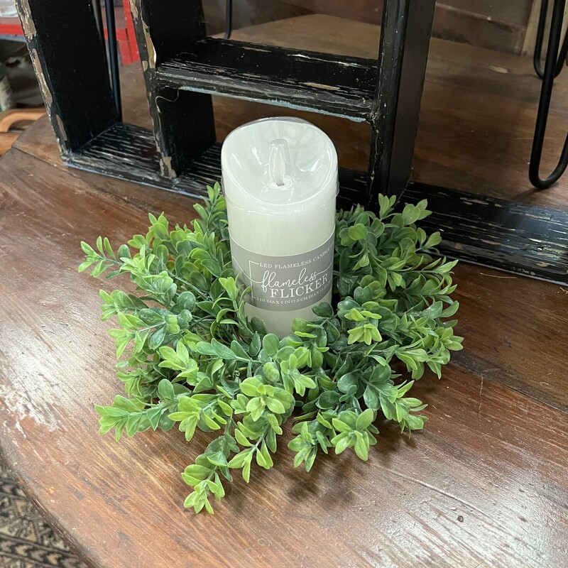 This beautful Boxwood Candle Ring has a soft almost real feel and measures 4.5 inches inside and 11 inches outer.  This candle ring is a perfect touch of greenery to add to your spring decor.