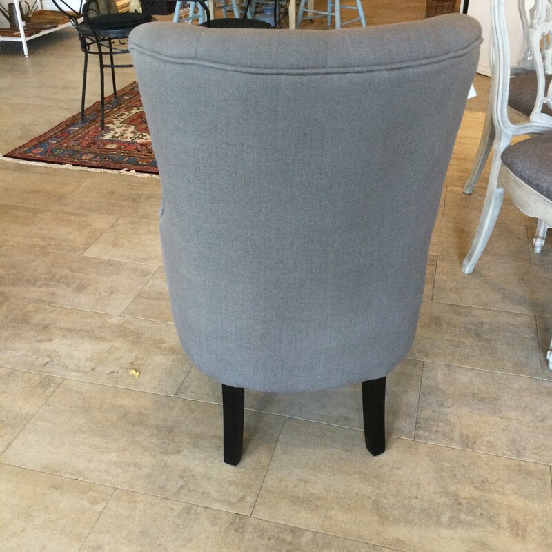 Tufted Accent Chair With Nail Head Accents<br />
Turned legs With Castors<br />
Grey<br />
Size: 24 X 28 In