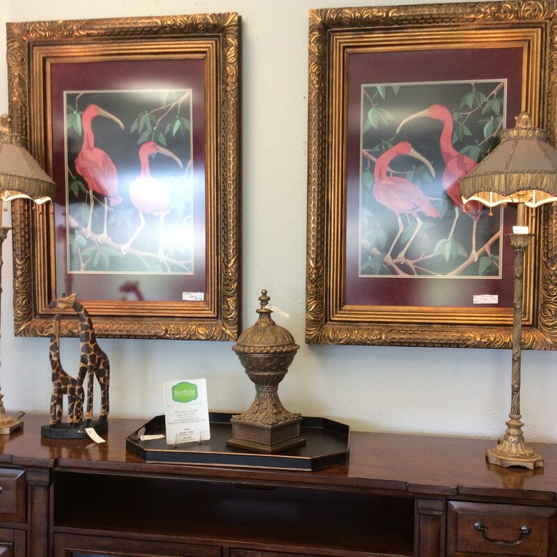 This is a pair of beautiful ornate buffet lamps. These lamps have bee's carved into the base and have nice green and leapord shades with tassels.