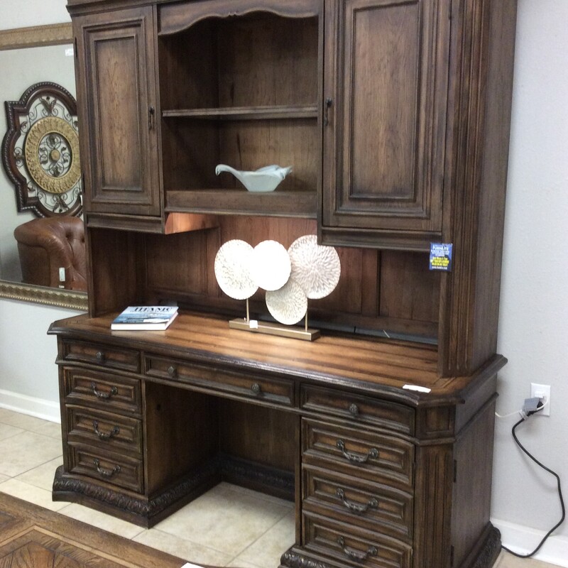 This is a beautiful Hooker Desk and Hutch set. The hutch has 2 lights 6 drawers and 1 file cabinet. The desk has 6 drawers and 1 file cabinet also.